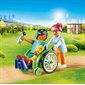 PATIENT EN FAUTEUIL ROULANT