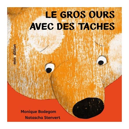 Le gros ours avec des taches