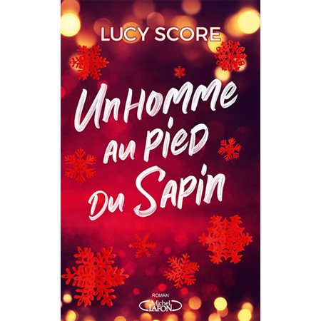 Un homme au pied du sapin
